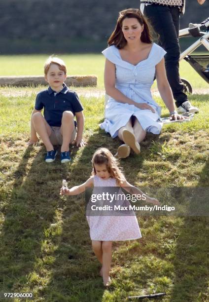 Prince George of Cambridge, Catherine, Duchess of Cambridge and Princess Charlotte of Cambridge attend the Maserati Royal Charity Polo Trophy at the...