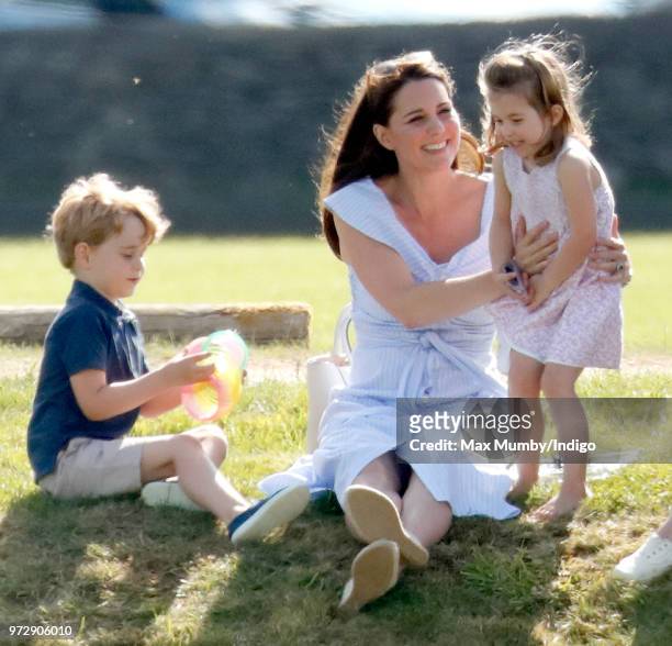 Prince George of Cambridge, Catherine, Duchess of Cambridge and Princess Charlotte of Cambridge attend the Maserati Royal Charity Polo Trophy at the...