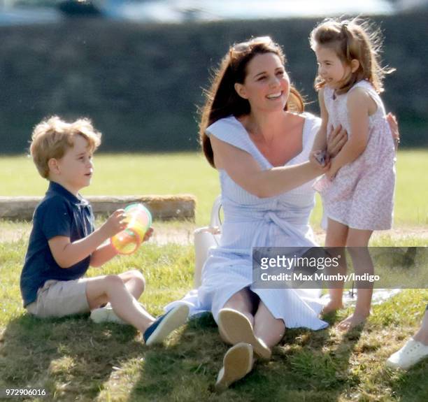Prince George of Cambridge, Catherine, Duchess of Cambridge and Princess Charlotte of Cambridge attend the Maserati Royal Charity Polo Trophy at the...
