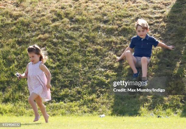 Prince George of Cambridge and Princess Charlotte of Cambridge attend the Maserati Royal Charity Polo Trophy at the Beaufort Polo Club on June 10,...