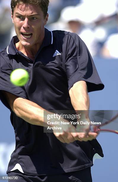 Marat Safin keeps his eye on the ball as he hits a return to Nicolas Kiefer at the U.S. Open in Flushing Meadows. The sixth-seeded Safin advanced to...