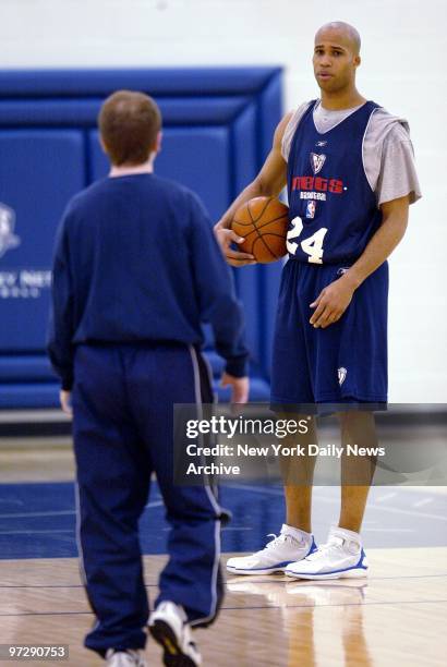 New Jersey Nets' coach Lawrence Frank talks to forward Richard Jefferson during a workout at Champion Center in East Rutherford, N.J. Having made...