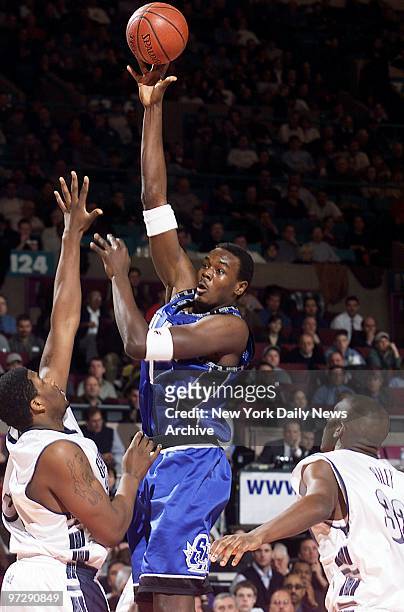 Seton Hall's Samuel Dalembert scores two in the first half against Georgetown in the Big East tournament quarterfinals at Madison Square Garden. The...