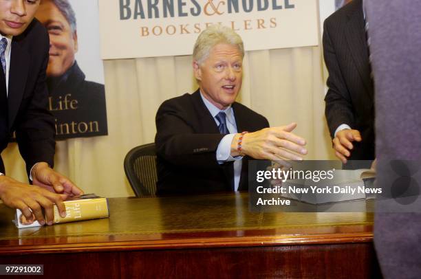 Former President Bill Clinton greets customers at the Barnes & Noble bookstore at Fifth Ave. And 48th St., where he autographed copies of his...