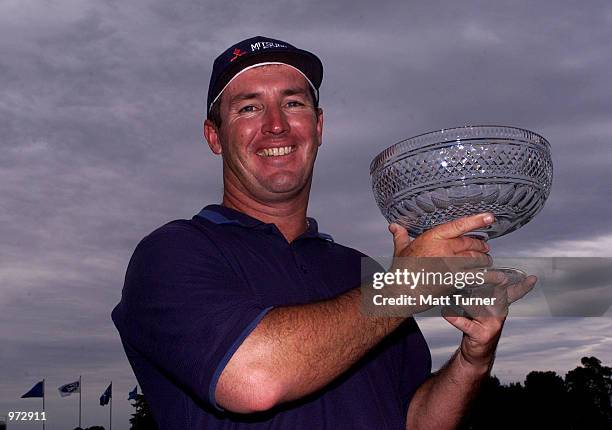 Peter Lonard of Australia, holds the trophy after winning the South Australian Ford Open Championships with a total score of 269 , held at Kooyonga...