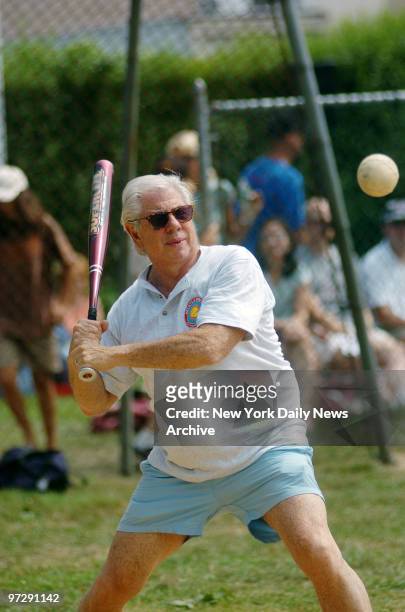 Carl Bernstein keeps his eye on the ball during the 57th annual Artists and Writers Softball Game this afternoon at Herrick Park in East Hampton,...