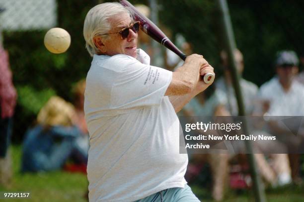 Carl Bernstein swings - and misses - but it's all in good fun at the 57th annual Artists and Writers Softball Game this afternoon at Herrick Park in...