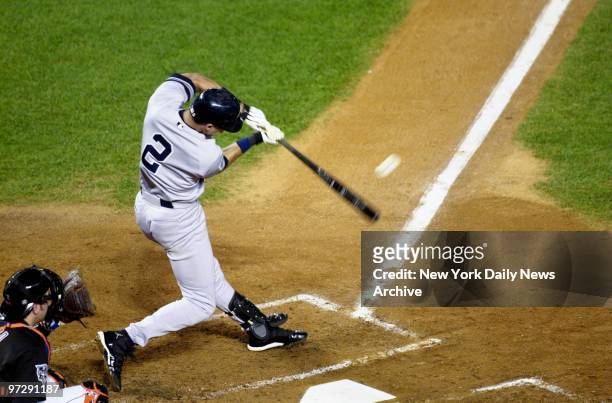 New York Yankees' Derek Jeter smacks the first pitch of the game over the left field fence for a homer as the Yanks went on to beat the New York...
