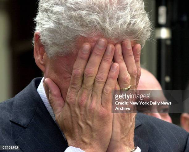 Former President Bill Clinton mocks an embarrassing moment as Congressman Rangel reminds Clinton of something at the dedication of a restored Harlem...