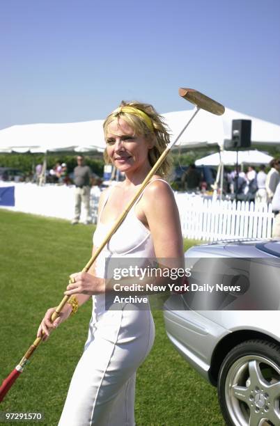 Sex and the City star Kim Cattrall wields a mallet at the ninth annual Mercedes-Benz Polo Challenge at the Haygound in Bridgehampton, L.I. Money...