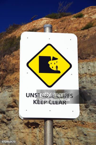 'unstable cliffs: keep clear' sign - hazardous area sign stock pictures, royalty-free photos & images