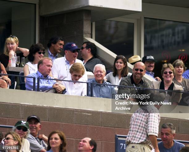 Former President Jimmy Carter and wife Rosalynn enjoy the action at the U.S. Open men's final in Flushing Meadows.
