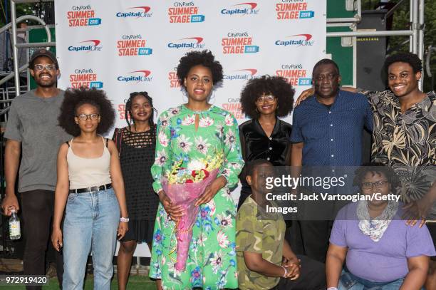 American Soul & Folk musician Victory Boyd poses backstage with members of her family after performing at a concert in the Blue Note Jazz Festival at...