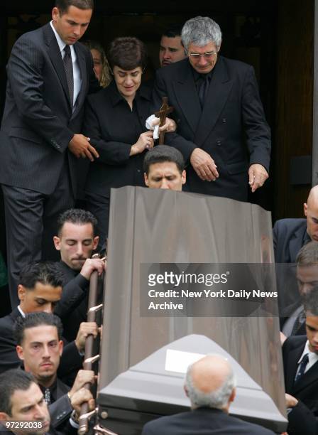 Maria and Constantine DeCorato follow the coffin of their son, Tino, from Our Lady of Grace Catholic Church in Gravesend, Brooklyn. DeCorato was shot...
