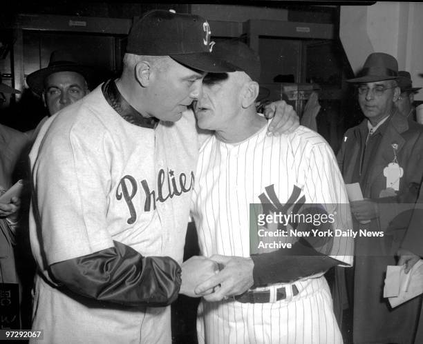 New York Yankees' manager Casey Stengel has a word with Philadelphia Phillies' manager Eddie Sawyer. The Yankees beat the Phillies in the World...