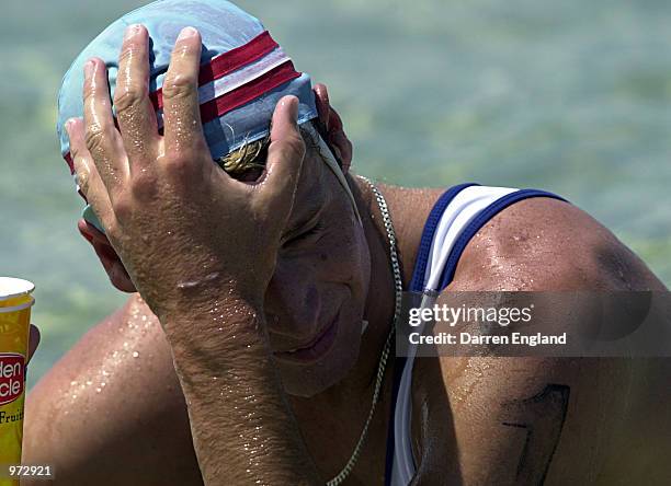 Wes Berg of Australia shows his disappointment after losing round two of the Uncle Toby's Ironman Super Series held at Coolangatta beach on the Gold...