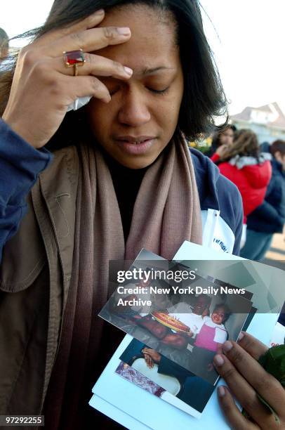 Maria DeJesus grieves for her lost husband, Angel Celestino, during a memorial service this morning on the fourth anniversary of the crash of...