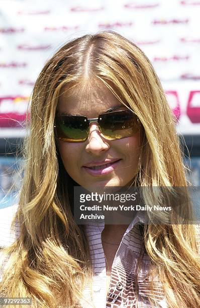 Carmen Electra offers encouragement at Union Square Park, where a crowd of New Yorkers entered a giant pool - and the Guinness Book of World Records,...