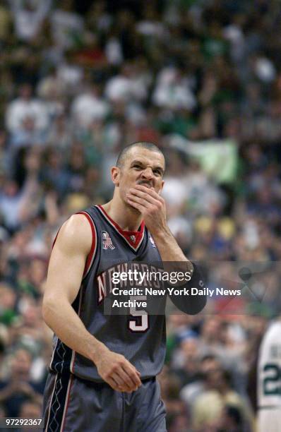 New Jersey Nets' Jason Kidd watches in disbelief on his way to the bench as the Boston Celtics take the lead during the final minute of Game 3 of the...