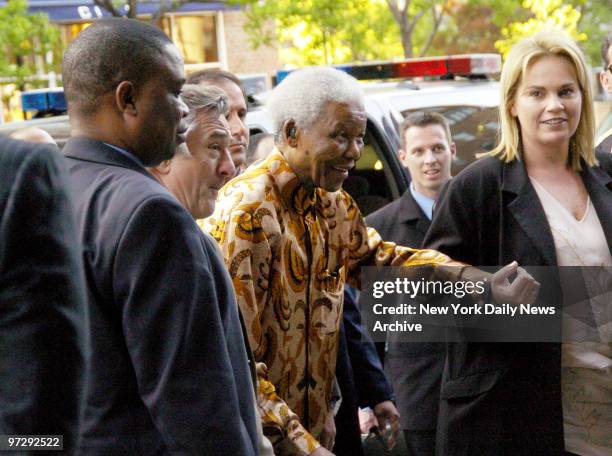 Former South African President Nelson Mandela arrives at the Tribeca Grill for a gala dinner hosted by actor Robert De Niro to mark the 15th...
