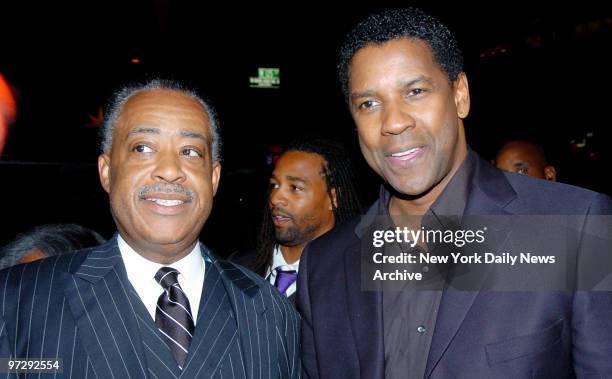 The Revernd Al Sharpton and actor Denzel Washington attend the World Premiere of "American Gangster" held at the ApolloTheater in Harlem on Friday....