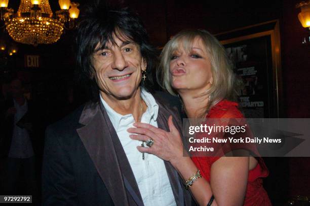 The Rolling Stones' Ron Wood and wife Jo are at the Ziegfeld Theatre for the New York premiere of the movie "The Departed."