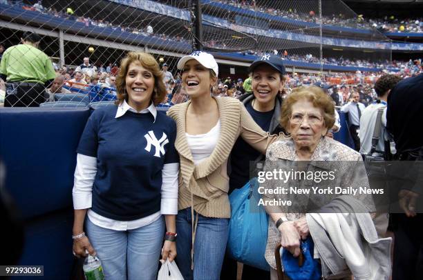 New York Yankees' fan Jennifer Lopez takes mom Guadalupe, her cousin and her grandmother to Shea Stadium to enjoy Game 2 of a three-game Subway...