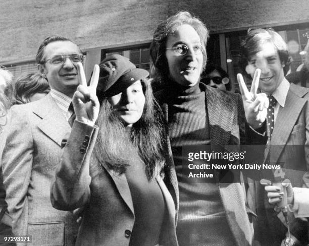 John Lennon and Yoko Ono with attorney Leon Wildes as they leave the Immigration and Naturalization Service at 20 W. Broadway.
