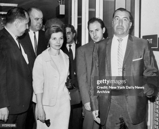 Former wife of dictator Juan Peron, Isabella Martinez Peron, walking from plane as she stopped off at Kennedy Airport in New York en route to...