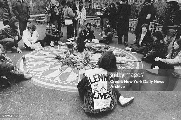 John Lennon fans gather at Strawberry Fields in Central Park on the anniversary of his death.