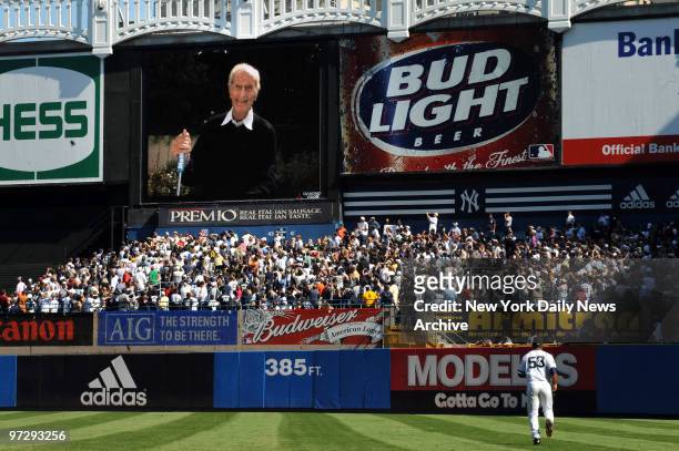 Former Yankee announcer Bob Sheppard pushes the button to show 1 game remaining at Yankee Stadium during the 6th inning of the Yankees 1-0 win., New...