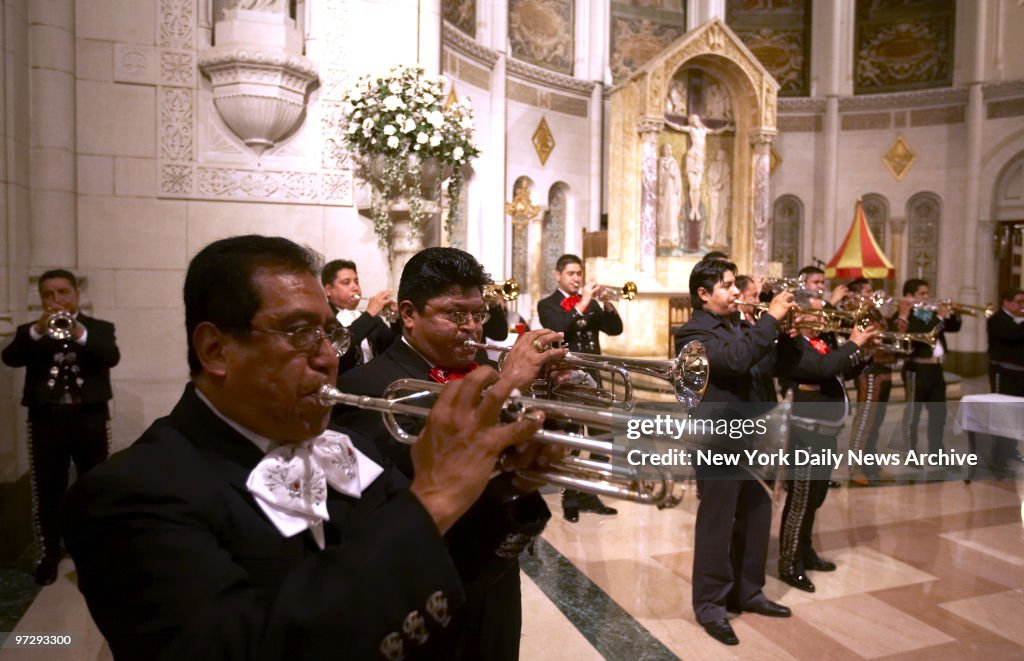 Mariachis play during a mass commemorating Saint Cecilia, th