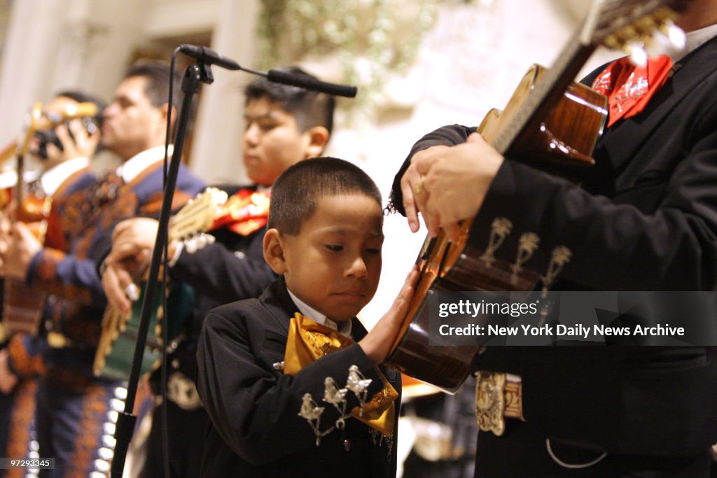 Mariachis play during a mass commemorating Saint Cecilia, th