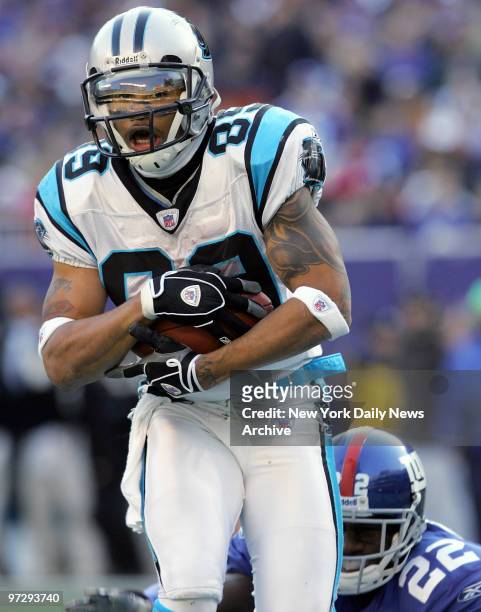 Carolina Panthers' wide receiver Steve Smith crosses the goal line for a touchdown catch during the NFC wild-card playoff game against the New York...