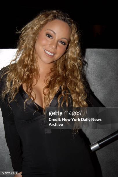 Mariah Carey is on hand at the Hayden Planetarium for a listening party for her upcoming album "Charm Bracelet," which will be released in December.