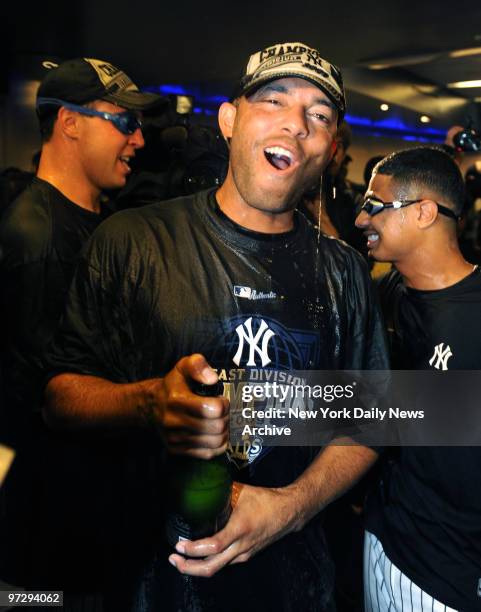 Mariano Rivera celebrates his 11th divison title with Yankees at the club house after the Yankees defeated the Red Sox 4-2 winning the American...