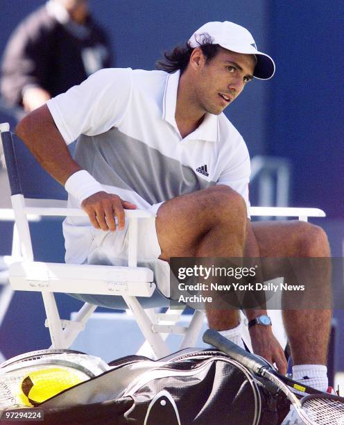 Mariano Zabaleta of Argentina gets ready to pack up after losing to Marat Safin in the U.S. Open in Flushing Meadows-Corona Park in Queens. Safin,...