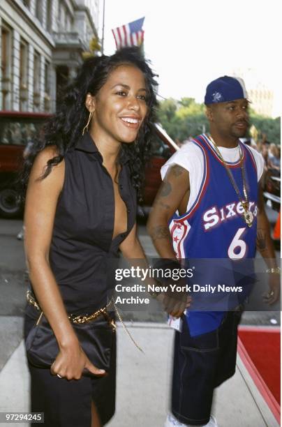 Singer Aaliyah and music producer Damon Dash arrive at the Paris Theatre on W. 58th St. For the premiere of the movie "The Others."