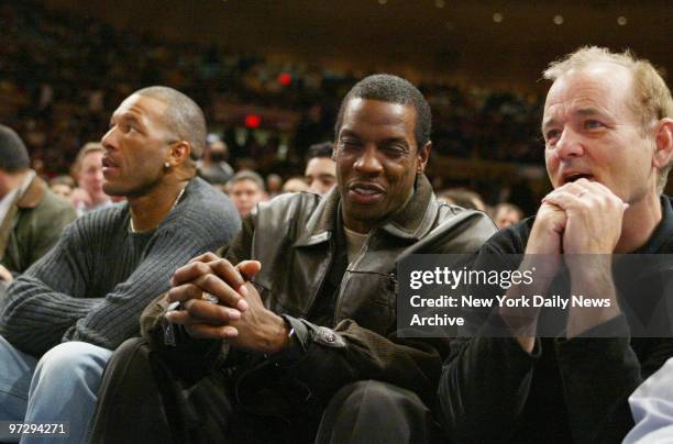 New York Yankees' Gary Sheffield, Dwight Gooden and actor Bill Murray sit court side as the the New York Knicks play the Cleveland Cavaliers at...