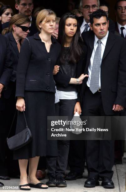 Mariel and Miguel Carballo stand with their daughter, Celeste, outside Frank E. Campbell funeral home on Madison Ave. After funeral services for...