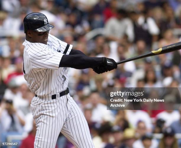 New York Yankees' Glenallen Hill slams a home run in the second inning of game against the Cleveland Indians at Yankee Stadium. The Yankees won, 6-3.