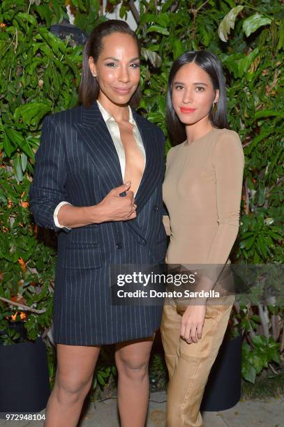 Amanda Brugel, wearing Max Mara, and Kelsey Asbille attend the Max Mara Celebration for Alexandra Shipp, 2018 Women In Film Max Mara Face Of The...