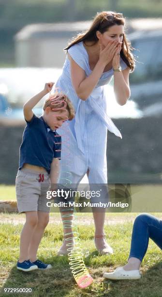 Prince George of Cambridge and Catherine, Duchess of Cambridge attend the Maserati Royal Charity Polo Trophy at the Beaufort Polo Club on June 10,...