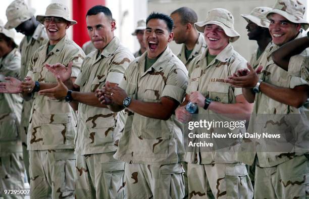 Marines from the 6th Communication Battalion are obviously glad to see Floyd Bennett Field in Brooklyn, where they had a reunion with their families....