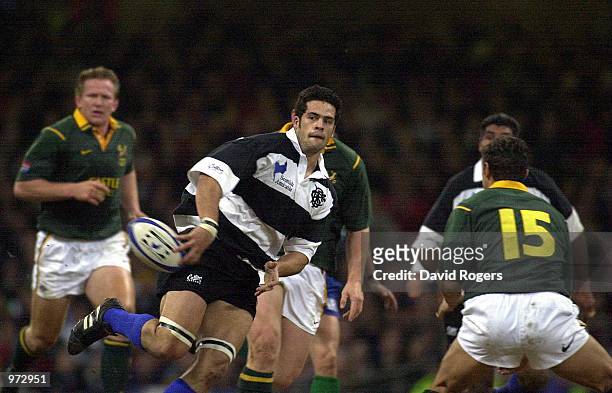 Ron Cribb of the Barbarians flicks the ball out to set up a try for Agustin Pichot during the match between Barbarians and South Africa in the...