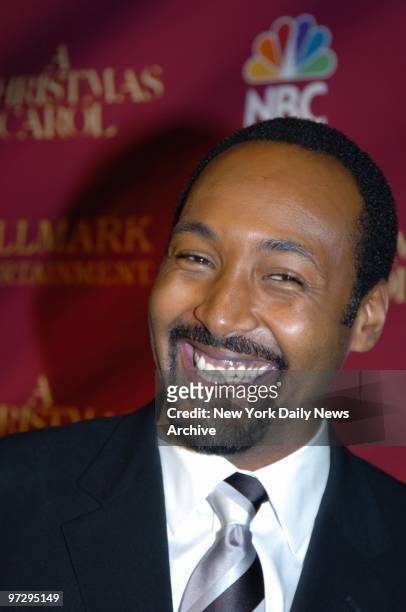 Jesse L. Martin flashes a big smile on arrival for a premiere screening of a musical version of "A Christmas Carol" at the Plaza Hotel. He's in the...