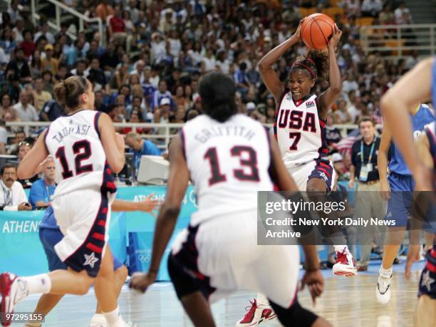 Sheryl Swoopes of the United States steals a pass in a women's quarterfinal basketball game against Greece at the 2004 Summer Olympic Games in...