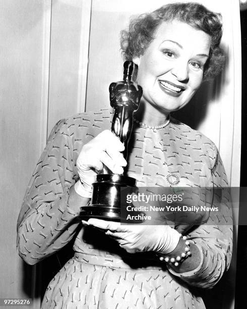 Shirley Booth with her Academy Award Oscar at 25th Annual Awards of Academy of Motion Pictures. Booth won for best performance by an actress for her...