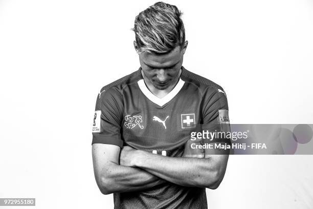 Nico Elvedi of Switzerland poses for a portrait during the official FIFA World Cup 2018 portrait session at the Lada Resort on June 12, 2018 in...