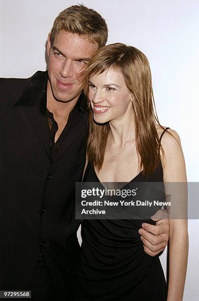 Celebrity makeup artist Kevin Aucoin and actress Hilary Swank get together at Emery Awards benefit for gay youth at the Altman Building.